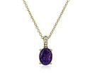 A birthstone pendant of oval-cut amethyst gemstone accented with diamond pavé through out the yellow gold setting and bail